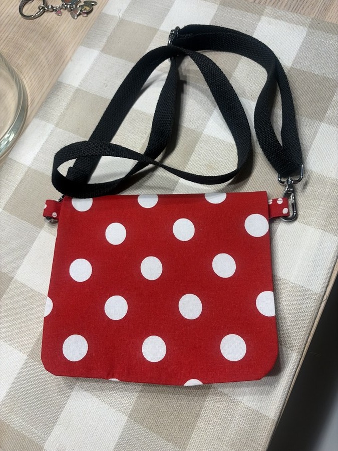 Finished red polka-dot crossbody